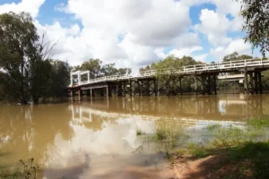 Photo looking across the river below the old bridge