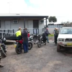 Photo of riders refuelling their bikes before the day starts.